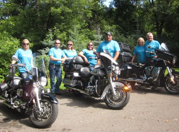 Wayne and Team in Their PatientsLikeMeInMotion T-Shirts