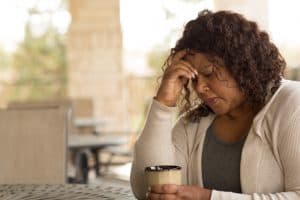 Middle aged woman experiencing fatigue